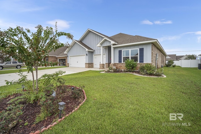 view of front of house featuring a garage and a front yard