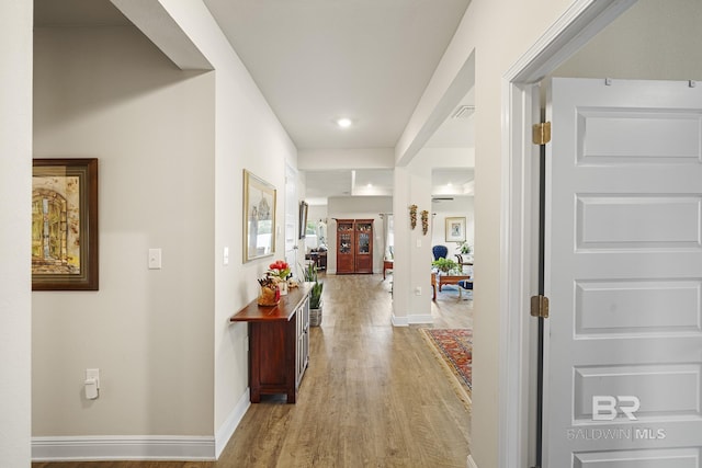 hall featuring light hardwood / wood-style flooring