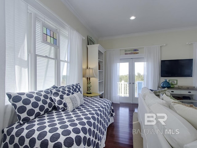 bedroom with access to exterior, dark wood-style floors, french doors, and ornamental molding