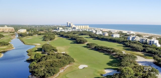 bird's eye view featuring golf course view and a water view