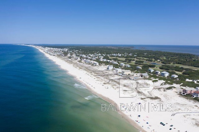 aerial view featuring a water view and a beach view