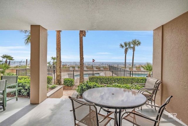 view of patio / terrace featuring a water view