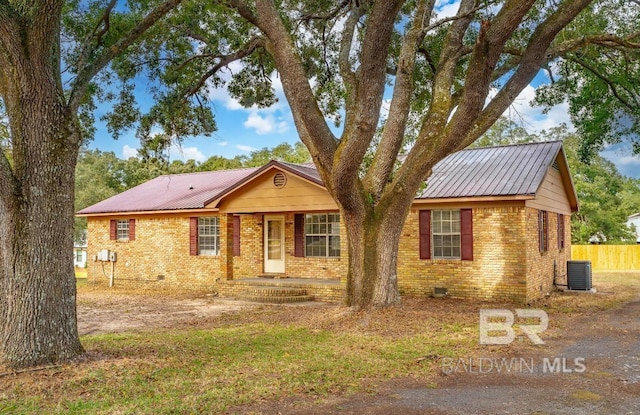 single story home with covered porch and central AC