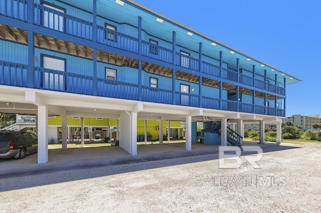 view of building exterior featuring a carport