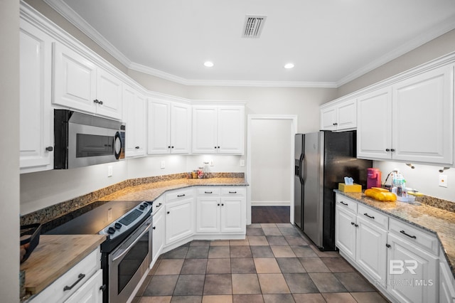 kitchen featuring white cabinetry and stainless steel appliances