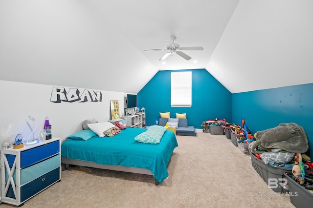 bedroom featuring vaulted ceiling, ceiling fan, and carpet