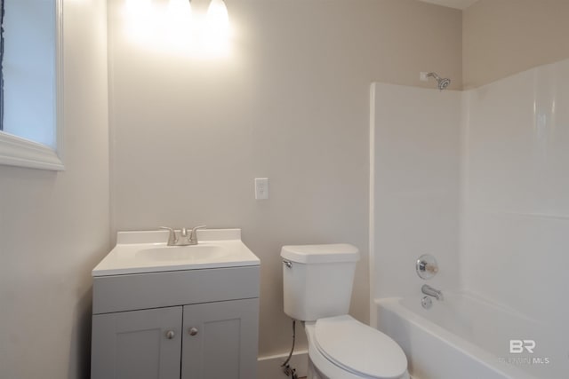 full bathroom featuring shower / bathtub combination, toilet, and vanity