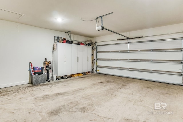 garage featuring a garage door opener