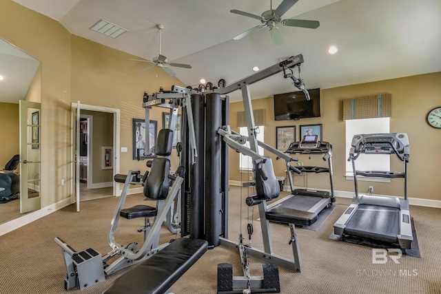 workout area with vaulted ceiling and ceiling fan