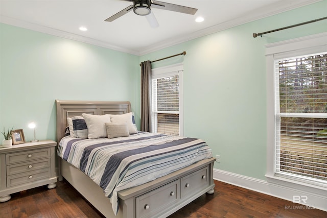 bedroom featuring dark hardwood / wood-style flooring, crown molding, and ceiling fan