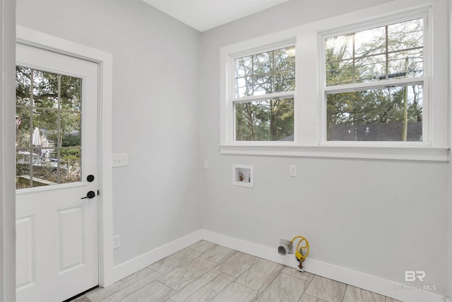 washroom with washer hookup and plenty of natural light