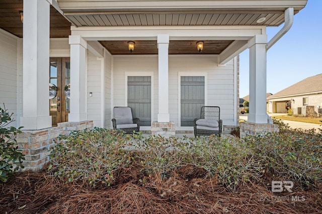 entrance to property with a porch