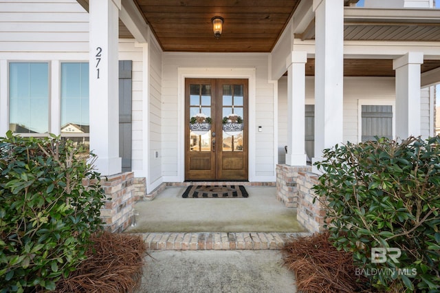 property entrance featuring french doors