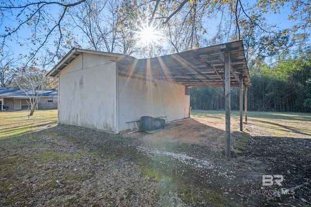 view of outdoor structure with a yard