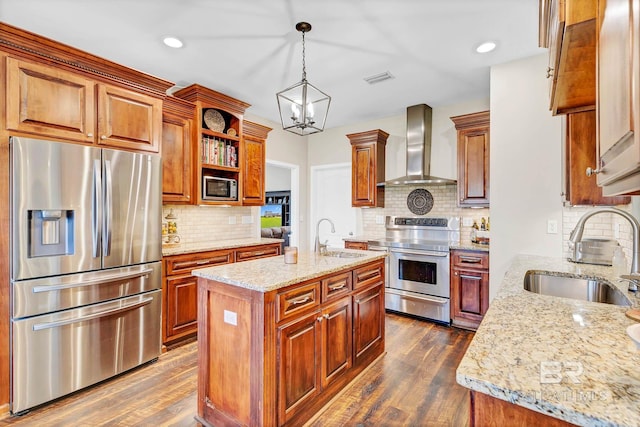 26506 Big Grant Way, Robertsdale, AL 36567 - kitchen with appliances with stainless steel finishes, wall chimney exhaust hood, tasteful backsplash, dark wood finished floors, and recessed lighting