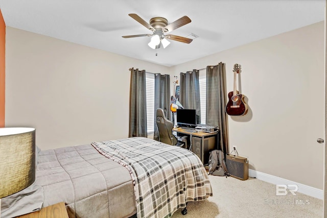 26506 Big Grant Way, Robertsdale, AL 36567 - carpeted bedroom featuring baseboards and a ceiling fan