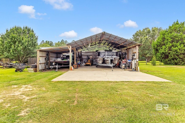 26506 Big Grant Way, Robertsdale, AL 36567 - view of patio / terrace with a detached carport