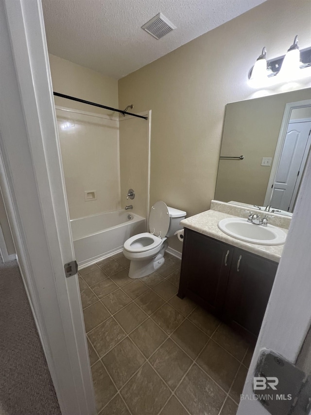 full bathroom featuring vanity, shower / bathtub combination, a textured ceiling, and toilet