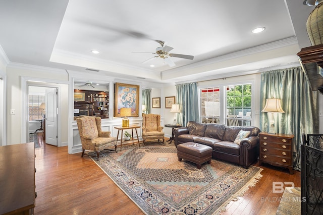402 Potters Mill Ave, Daphne, AL 36526 - living room with ceiling fan, a raised ceiling, ornamental molding, hardwood / wood-style flooring, and recessed lighting