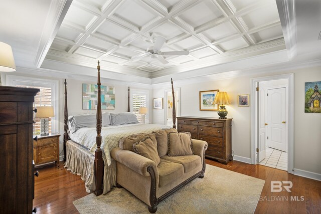 402 Potters Mill Ave, Daphne, AL 36526 - bedroom with crown molding, multiple windows, coffered ceiling, wood finished floors, and ceiling fan