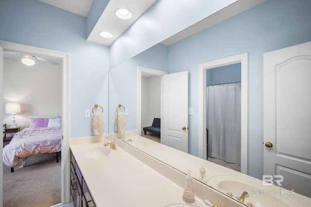 402 Potters Mill Ave, Daphne, AL 36526 - bathroom with ensuite bathroom, double vanity, and recessed lighting