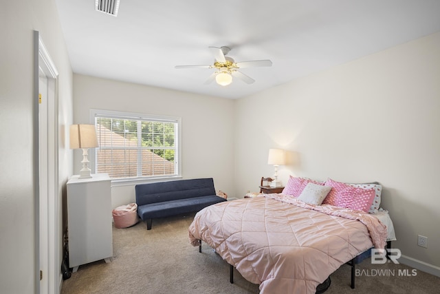 402 Potters Mill Ave, Daphne, AL 36526 - carpeted bedroom featuring a ceiling fan and baseboards