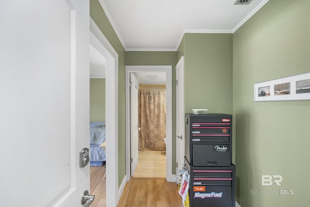 1095 Sea Cliff S Unit 1095, Daphne, AL 36526 - hallway with crown molding and wood finished floors