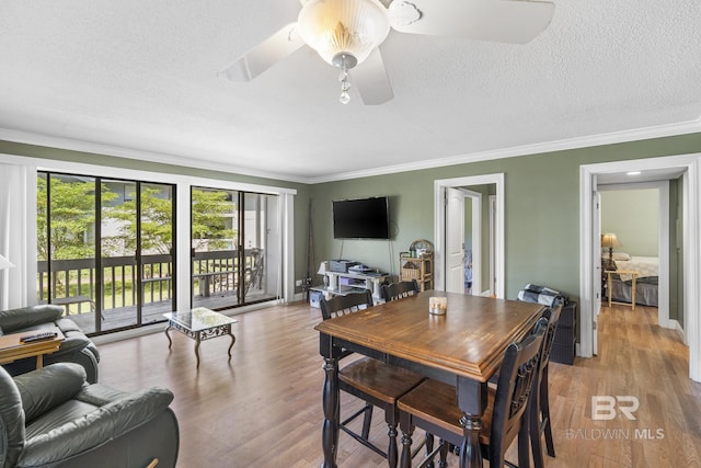 1095 Sea Cliff S Unit 1095, Daphne, AL 36526 - dining area featuring a textured ceiling, wood finished floors, and ornamental molding