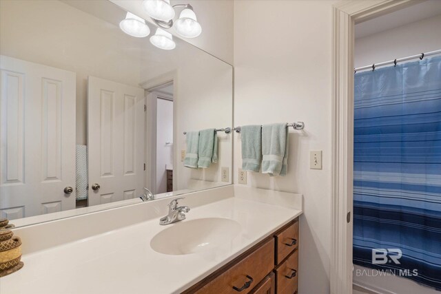 full bathroom featuring vanity and a shower with curtain