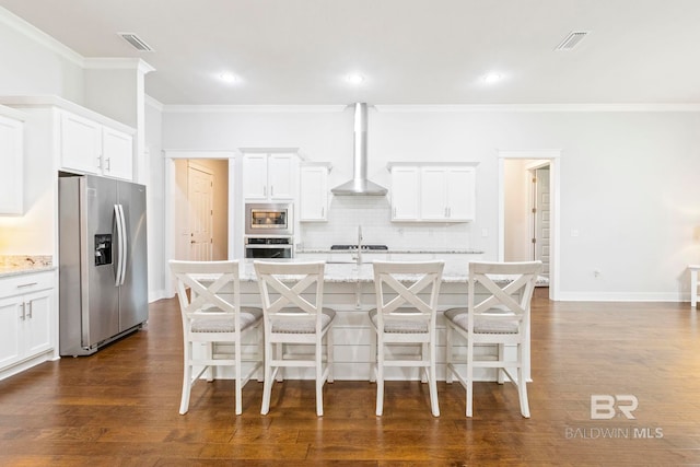 360 Nandina Loop, Fairhope, AL 36532 - kitchen featuring stainless steel appliances, ornamental molding, wall chimney exhaust hood, backsplash, and a kitchen island with sink