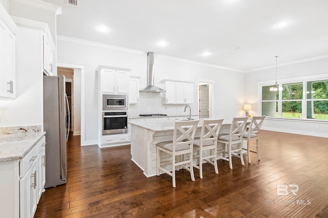360 Nandina Loop, Fairhope, AL 36532 - kitchen featuring appliances with stainless steel finishes, wall chimney range hood, a sink, crown molding, and tasteful backsplash