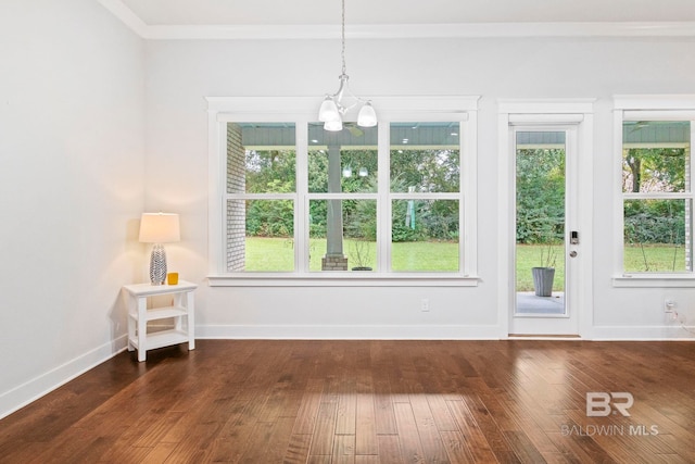 360 Nandina Loop, Fairhope, AL 36532 - dining room with a chandelier, hardwood / wood-style floors, plenty of natural light, baseboards, and ornamental molding