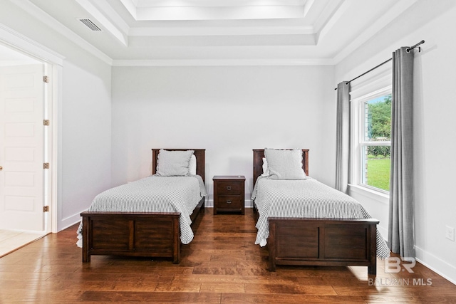 360 Nandina Loop, Fairhope, AL 36532 - bedroom featuring a tray ceiling, wood finished floors, and crown molding