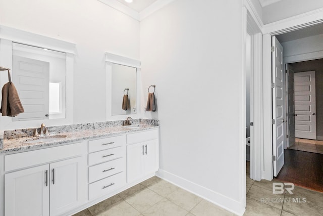 bathroom with vanity and tile patterned floors