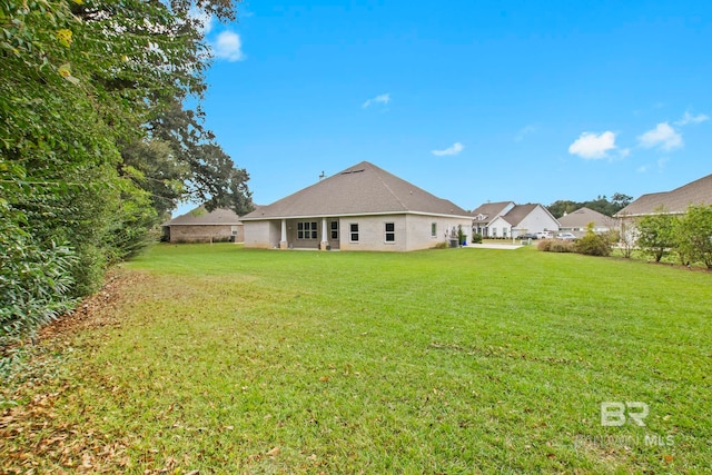 360 Nandina Loop, Fairhope, AL 36532 - back of property featuring a lawn