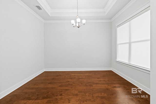 360 Nandina Loop, Fairhope, AL 36532 - spare room with a raised ceiling, a chandelier, dark wood-style flooring, crown molding, and baseboards
