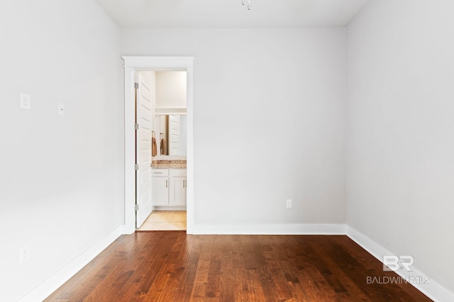 empty room featuring hardwood / wood-style floors