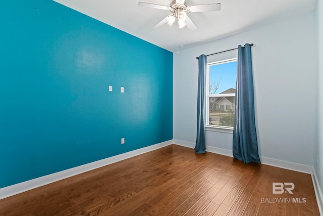 360 Nandina Loop, Fairhope, AL 36532 - unfurnished room featuring wood finished floors, a ceiling fan, and baseboards