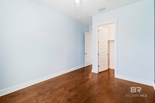 360 Nandina Loop, Fairhope, AL 36532 - unfurnished bedroom featuring wood finished floors and baseboards