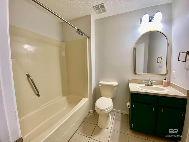 full bathroom with oversized vanity, toilet, tile flooring, a textured ceiling, and bathtub / shower combination