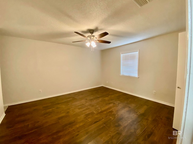 unfurnished room featuring wood-type flooring, ceiling fan, and a textured ceiling