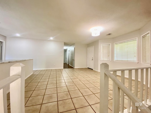 view of tiled spare room