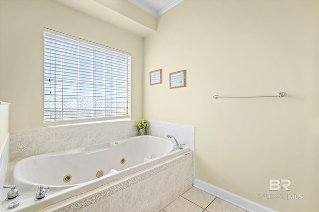 full bath featuring crown molding, a jetted tub, baseboards, and tile patterned floors