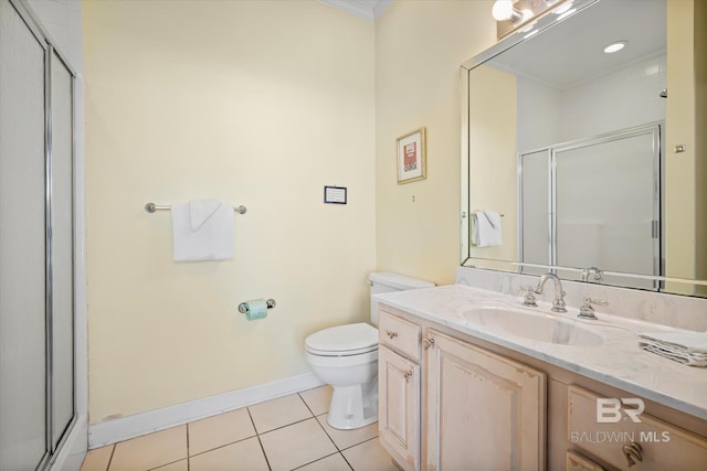 full bathroom with a stall shower, baseboards, toilet, tile patterned flooring, and vanity