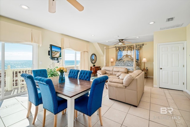 interior space featuring light tile patterned floors, visible vents, baseboards, a ceiling fan, and recessed lighting