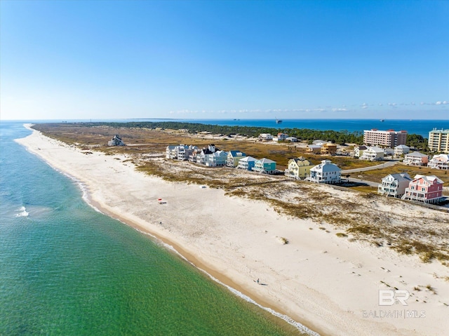 aerial view with a view of the beach and a water view