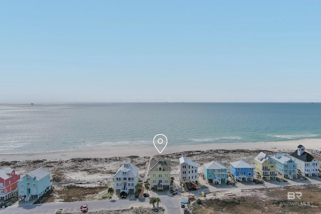 property view of water featuring a residential view and a beach view