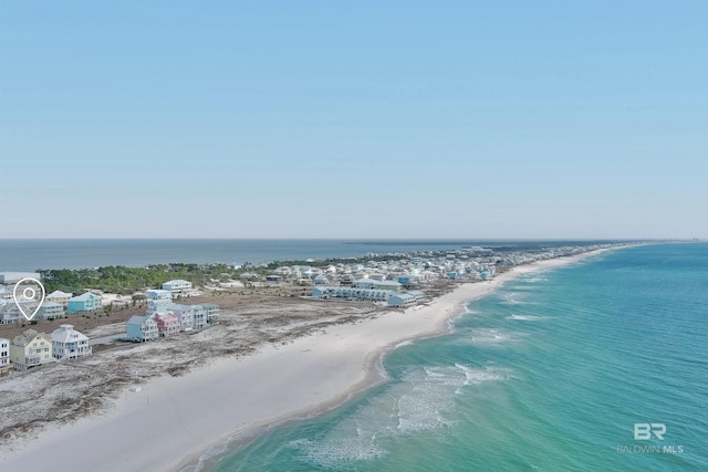 aerial view featuring a water view and a beach view