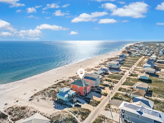 bird's eye view featuring a beach view and a water view