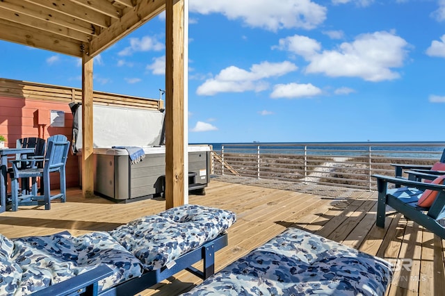 wooden deck with a water view